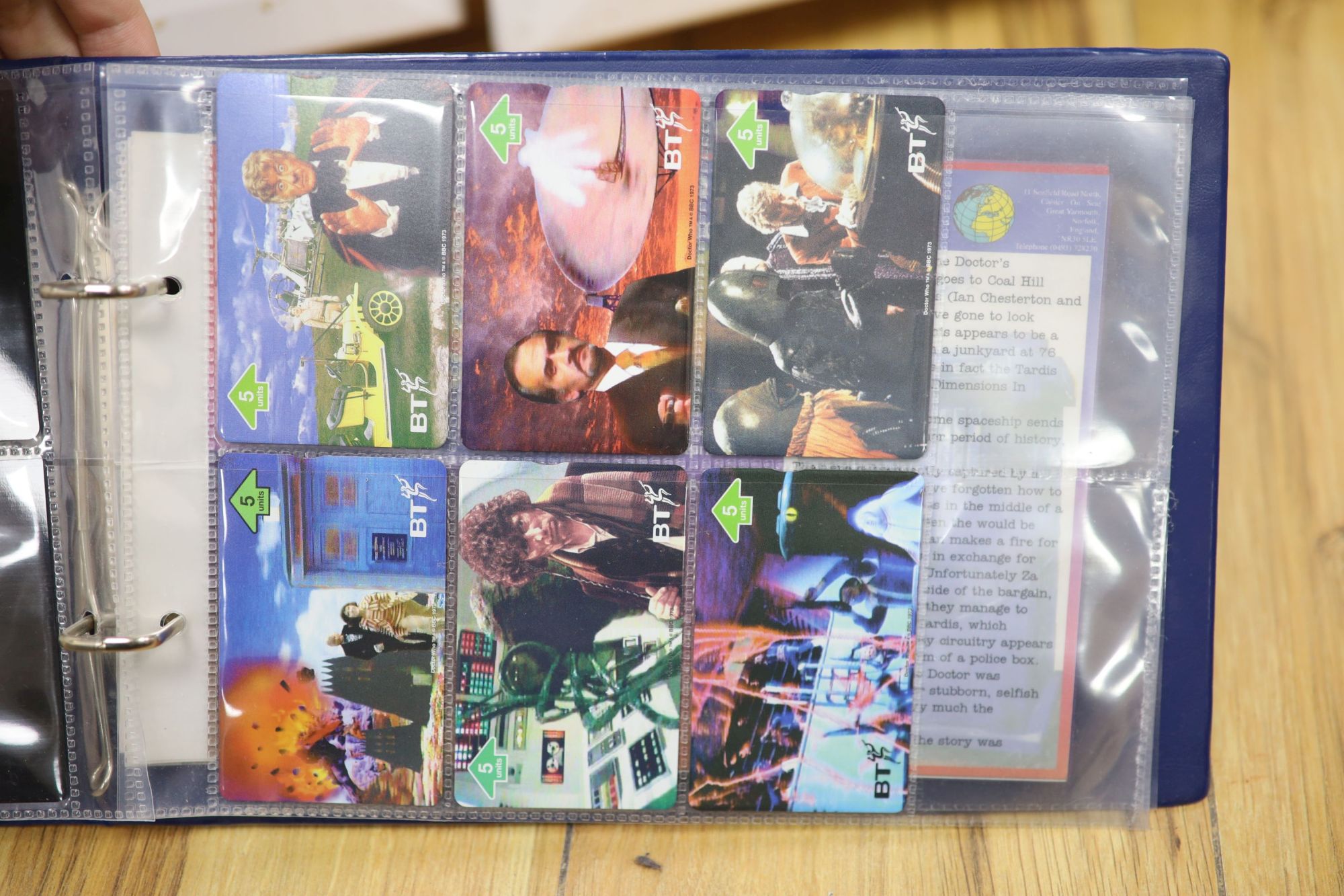 Four albums of phone cards including Dr Who, Star Wars, X Files, Disney etc.